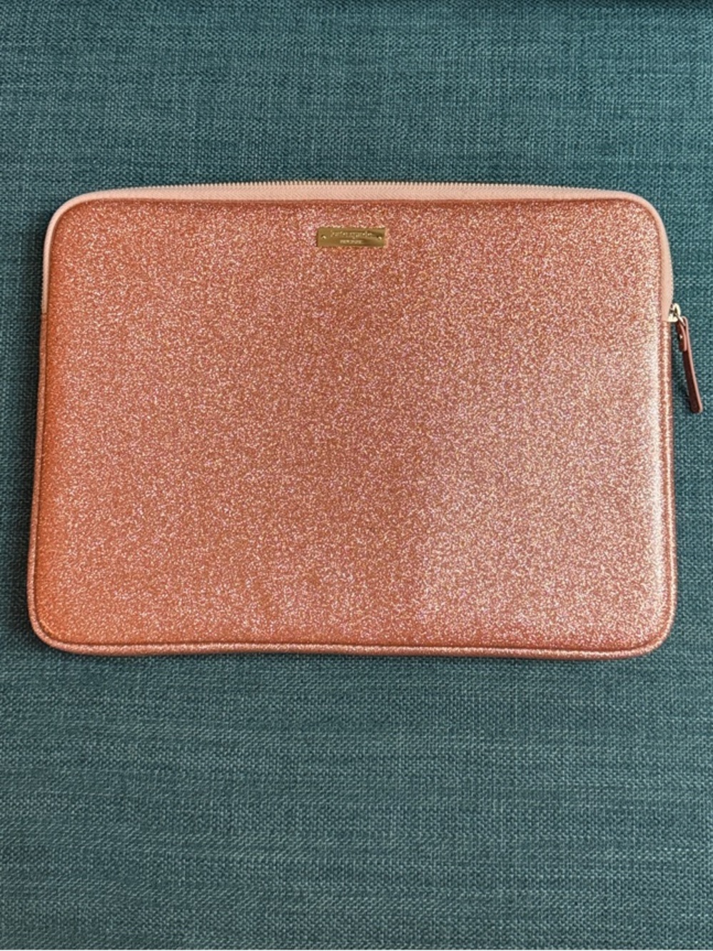 Kate Spade Rose Gold Glitter laptop sleeve.